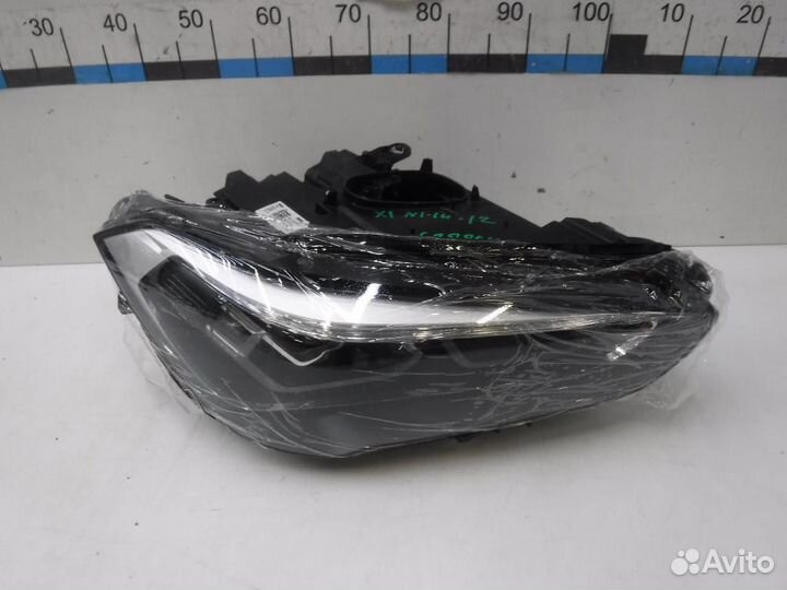 Фара правая BMW X1
