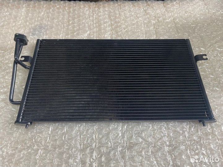 Радиатор кондиционера Mitsubishi Carisma дизель