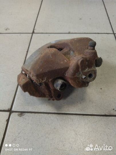 Суппорт тормозной передний правый Volkswagen Polo