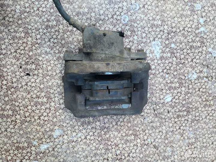 Суппорт тормозной Renault Logan