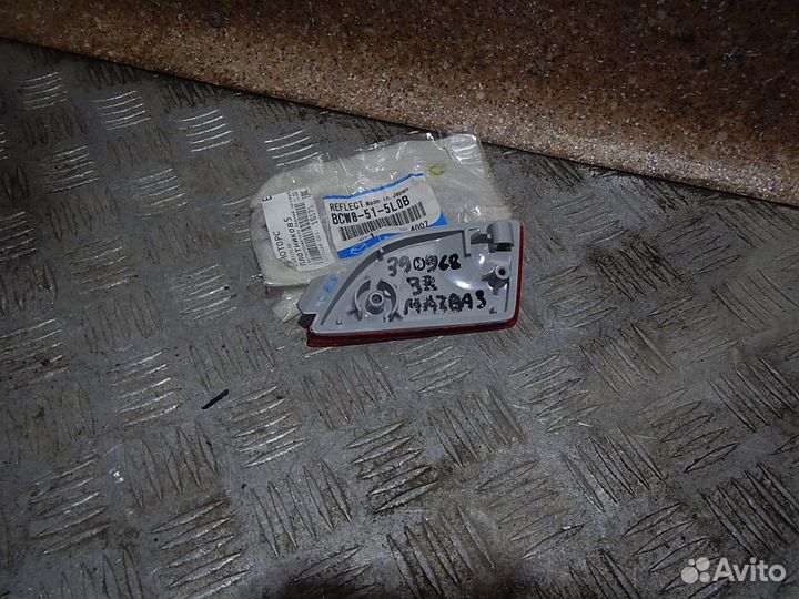 Отражатель в бампер задний правый, Mazda (Мазда)