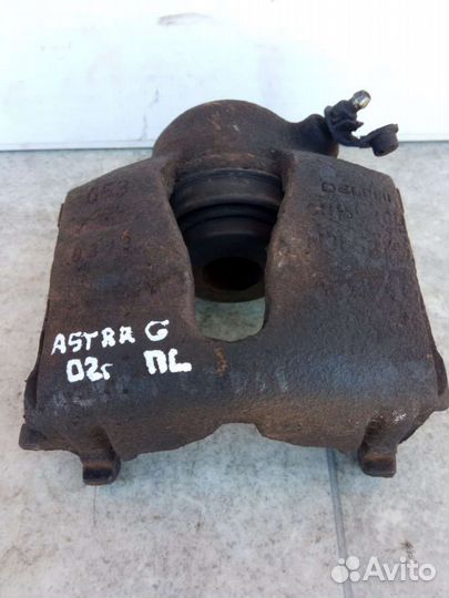 Суппорт тормозной передний левый Opel Astra G