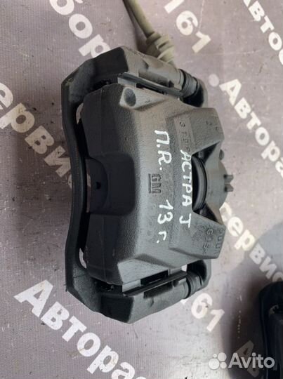 Суппорт передний opel astra j