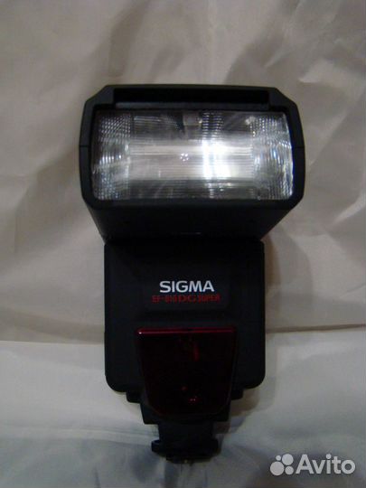Фотовспышка Sigma для фотоаппарата Canon