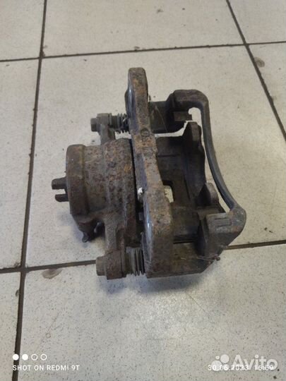 Суппорт тормозной передний левый Daewoo Gentra