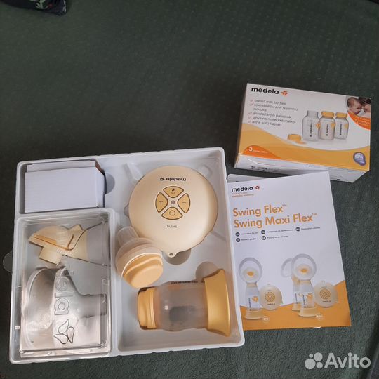 Молокоотсос medela swing flex электрический