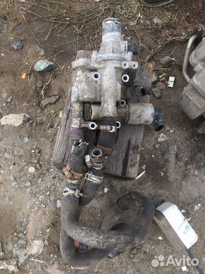 Корпус термостата Opel Meriva z16xer