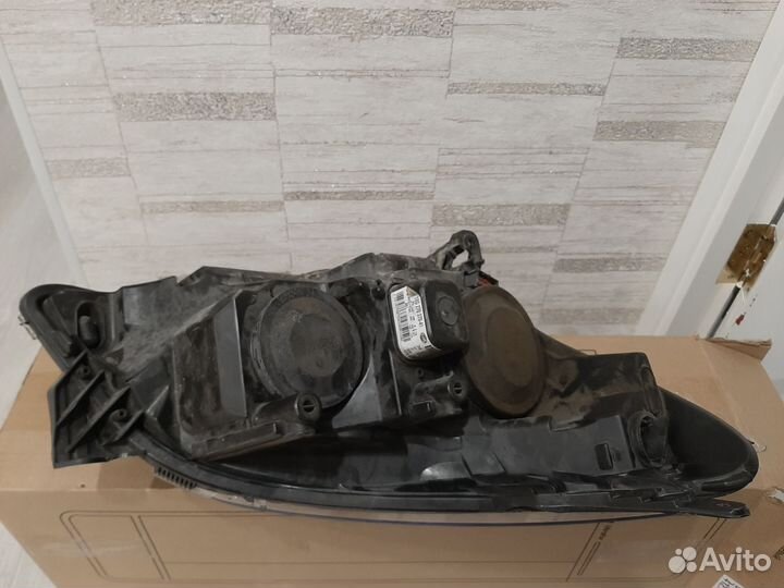 Фара передняя левая Opel Astra H 04-15г.в