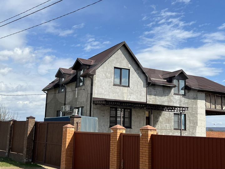 Дом 312,3 м² на участке 11 сот.