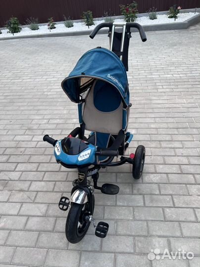 Детский трехколесный велосипед с ручкой