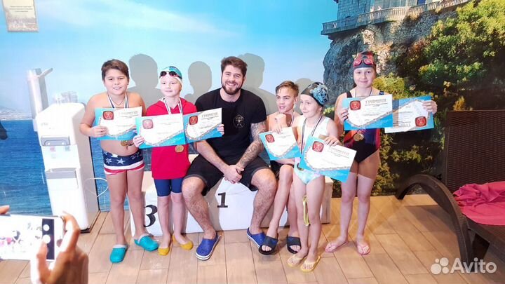 Тренер по плаванию