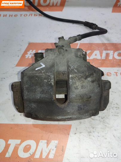 Суппорт тормозной передний левый Skoda Octavia