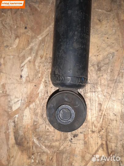 Стойка амортизатора задняя Mitsubishi Outlander