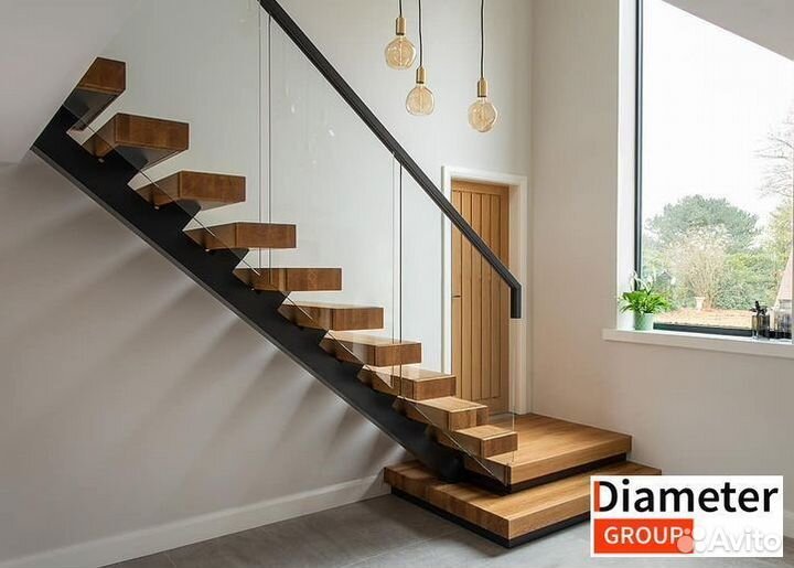 Установка широкой лестницы на ломаном косоуре