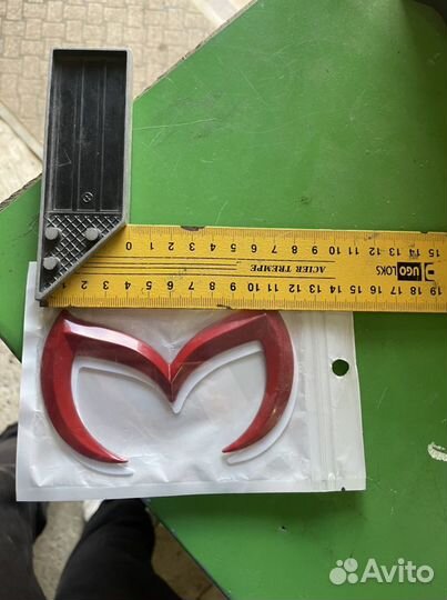 Эмблема mazda