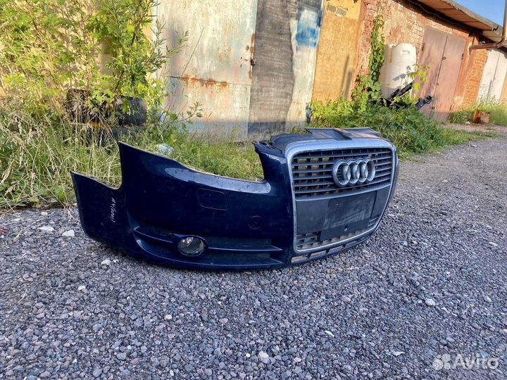 Передний бампер с решеткой на audi a4 b7