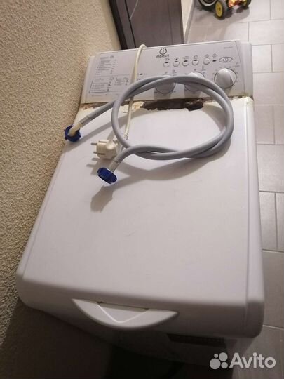 Стиральная машина с вертикальной загрузкой