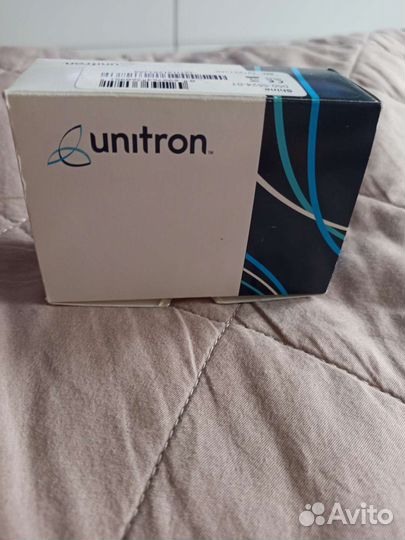 Слуховой аппарат новый Unitron