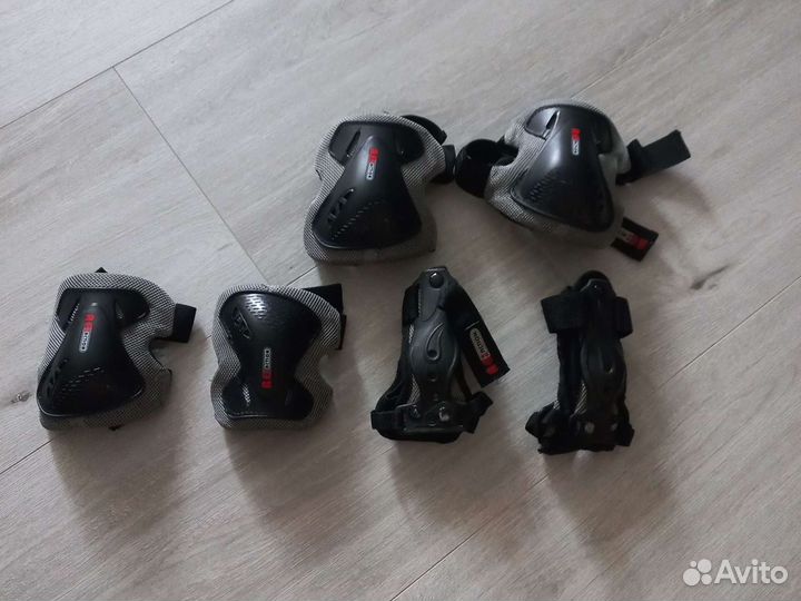 Роликовые коньки