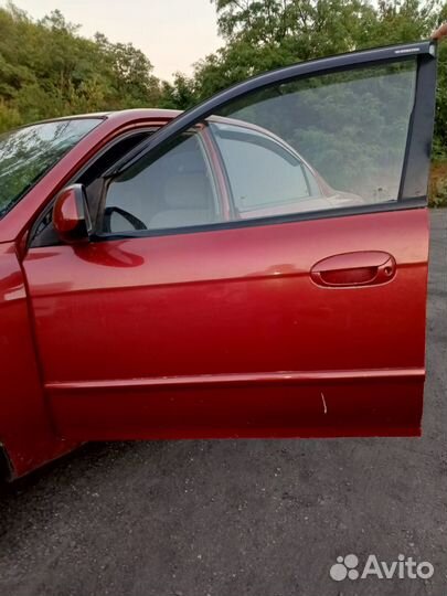 Двери Kia Spectra 1.6л AT 2004