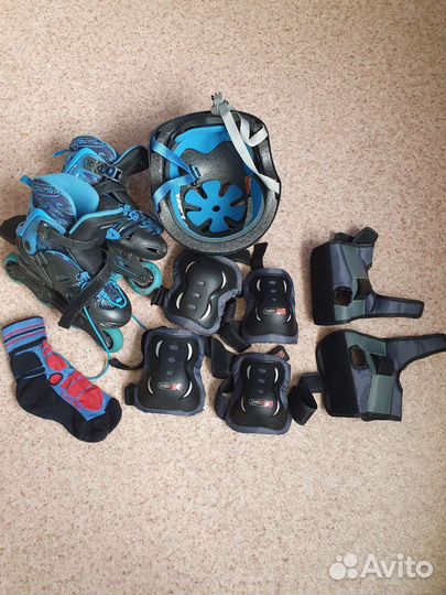 Роликовые коньки