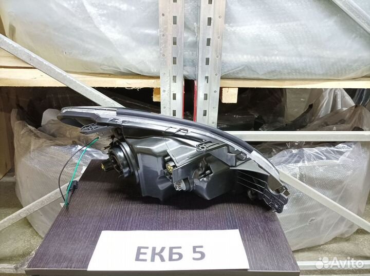 Левая фара Mitsubishi Lancer 9