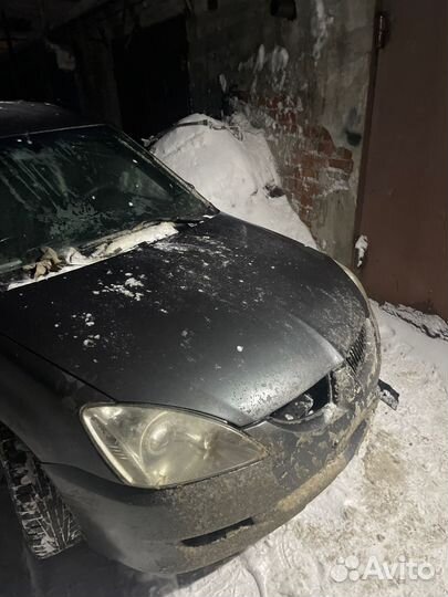 Капот на mitsubishi Lancer 9