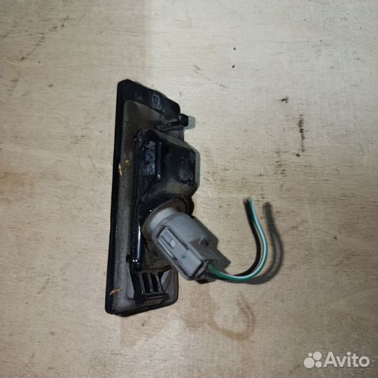 Фонарик подсветки номера Mitsubishi Lancer 2005г