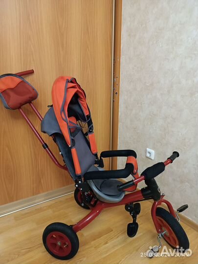 Трехколесный велосипед с ручкой