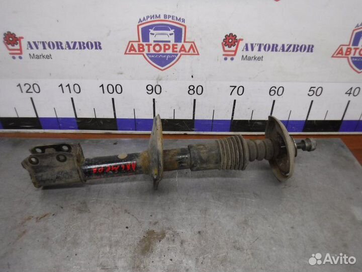 Амортизатор передний левый Nissan Almera G15 K4M