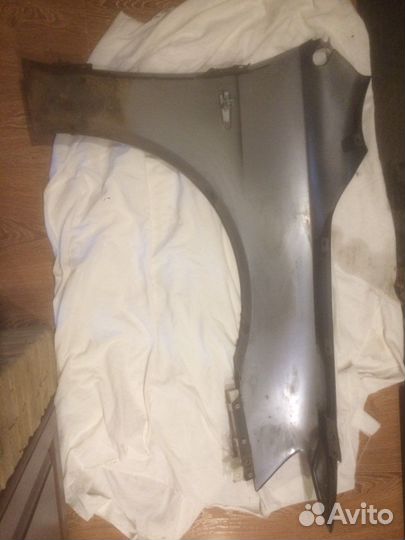 Левое крыло Митсубиси Лансер 10