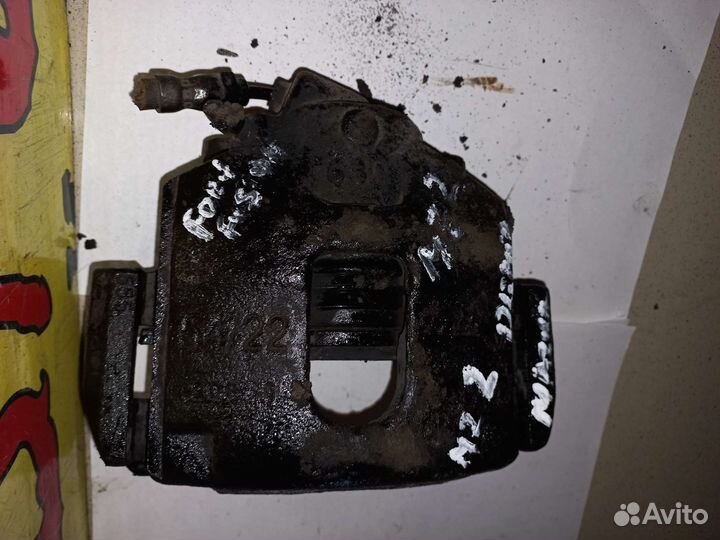 Суппорт передний правый Mazda Demio DY3W