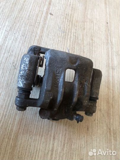 Суппорт тормозной задний левый Ssangyong Actyon