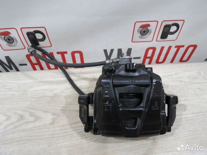 Суппорт тормозной передний правый VW Tiguan