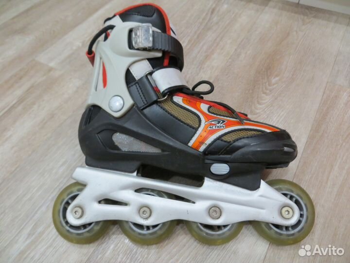 Роликовые коньки