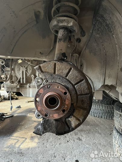 Поворотный кулак передний фольксваген passat b6