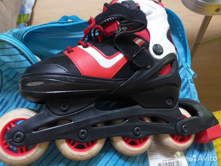 Роликовые коньки