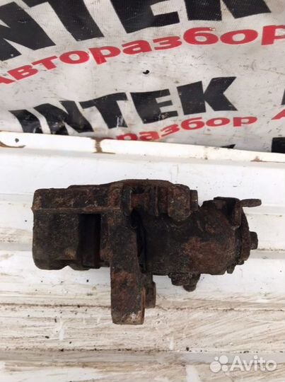 Суппорт тормозной задний левый Ford Mondeo 4