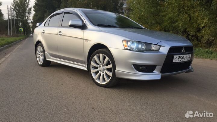 Заднее стекло на Mitsubishi Lancer 10 Установка