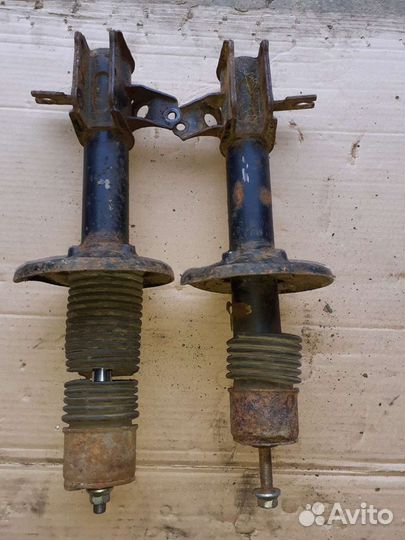 Амортизатор задний подвески Mазда 323 Ф 94-98 г