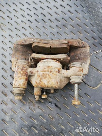 Тормозной суппорт Мазда Демио 1