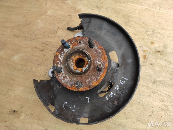 Кулак поворотный левый 1.3 1.4 1.6 Opel Astra J