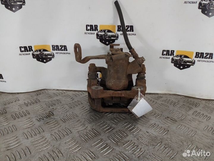 Суппорт тормозной задний правый R Mazda 6