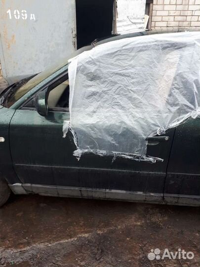 Дверь водительская Пассат Б 5