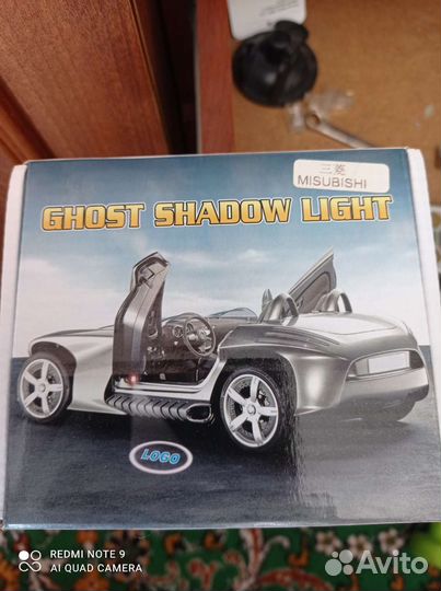 Подсветка в двери с логотипом Митсубиси