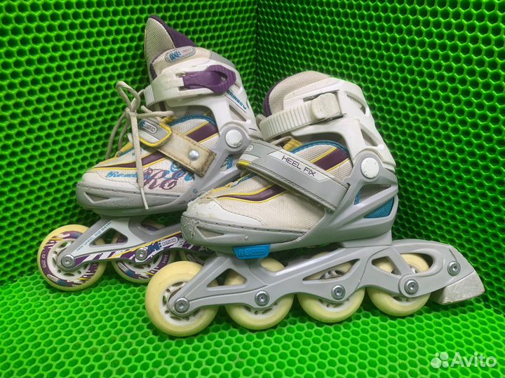 Роликовые коньки