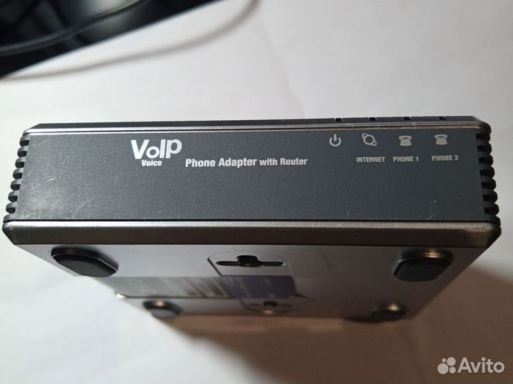 Телефонный VoIP адаптер Linksys SPA2102