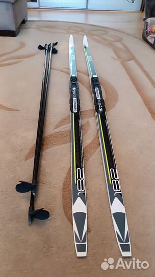 Беговые лыжи tisa с ботинками spine,два комплекта