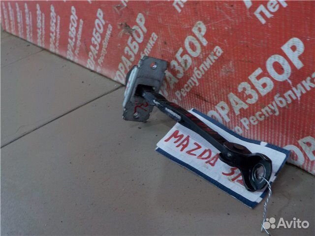 Ограничитель хода двери задний левый Mazda 3 BL Z6