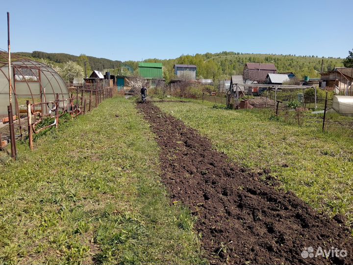 Вспашка земли мотоблоком